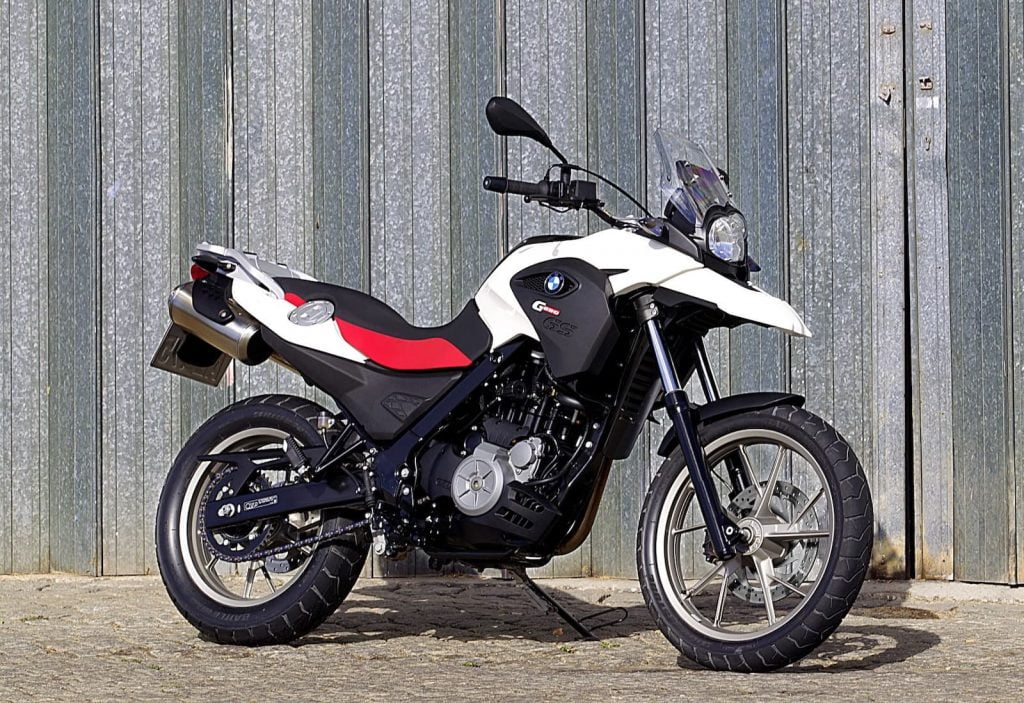 BMW G 650 GS against corrugated iron wall