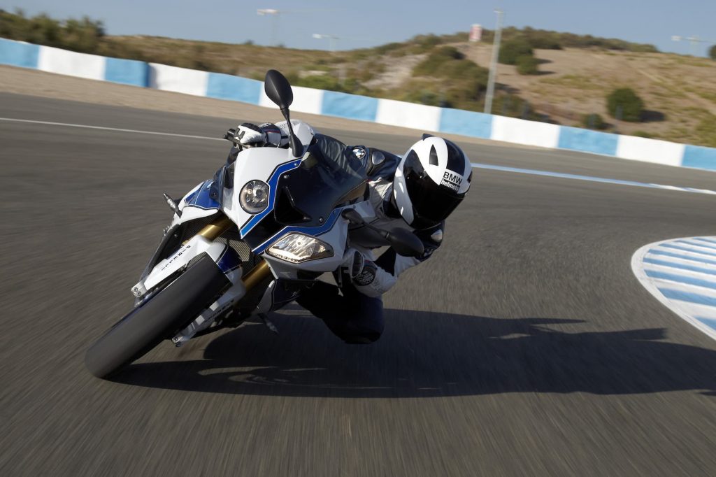 BMW HP4 on track leaned over left