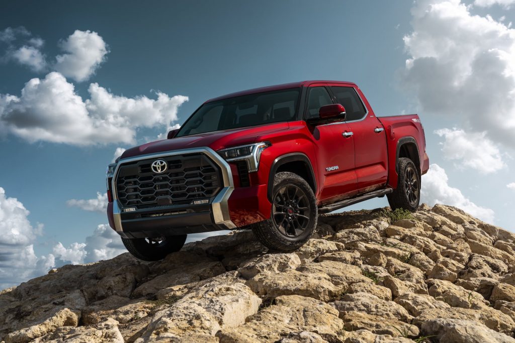 2022 Toyota Tundra Limited red on rocky outcrop